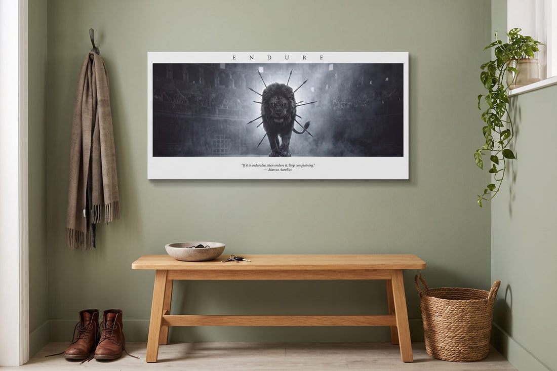 Amor fati: an Endure The Arena canvas in a sage-green entrance hall with a light oak bench and leather boots