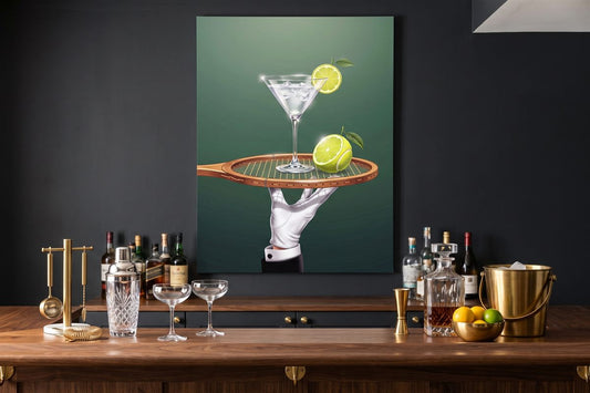 Basement bar ideas: a Drinks Are Now Served canvas above a home bar with a cocktail shaker and coupe glasses