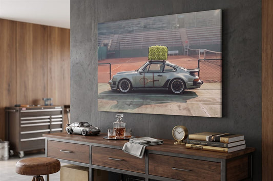 Garage man cave ideas: a Sideline Out car canvas on a concrete wall above a workbench with a model car