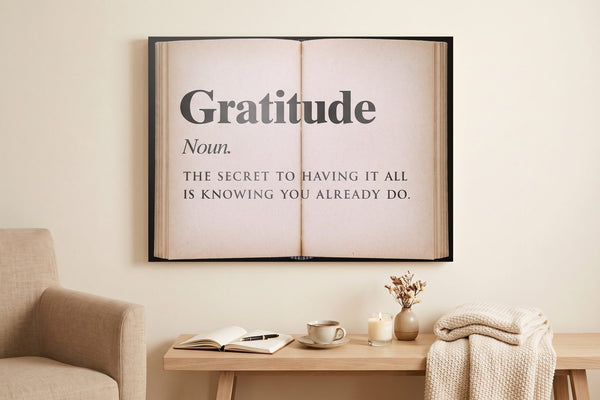 Gratitude quotes: a Gratitude Open Book canvas in a cream reading nook with an open journal and a cup of tea