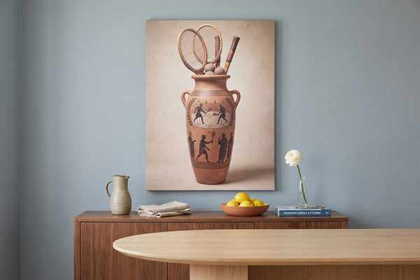 History of tennis: a Greek Tennis Vase canvas in a blue-gray dining room with a walnut sideboard and a bowl of lemons