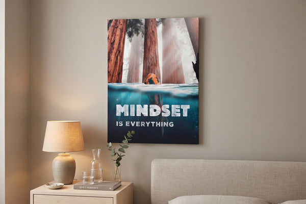 Koi fish meaning: a Mindset Is Everything Koi Edition canvas by a bedroom nightstand with a lamp and a glass carafe