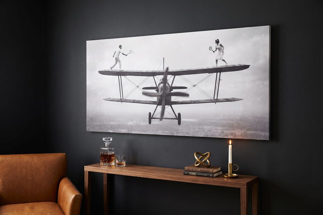 Small man cave ideas: Sky Match canvas on a dark lounge wall above a console with a whisky decanter
