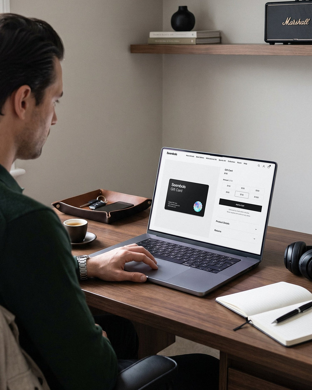 Man choosing a Seembols canvas art gift card amount on his laptop