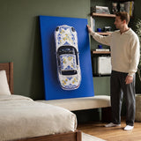Amalfi Coast Roadster German roadster with a blue Sicilian maiolica and lemon pattern canvas wall art in a styled study