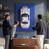Amalfi Coast Roadster German roadster with a blue Sicilian maiolica and lemon pattern canvas wall art in a living room lounge