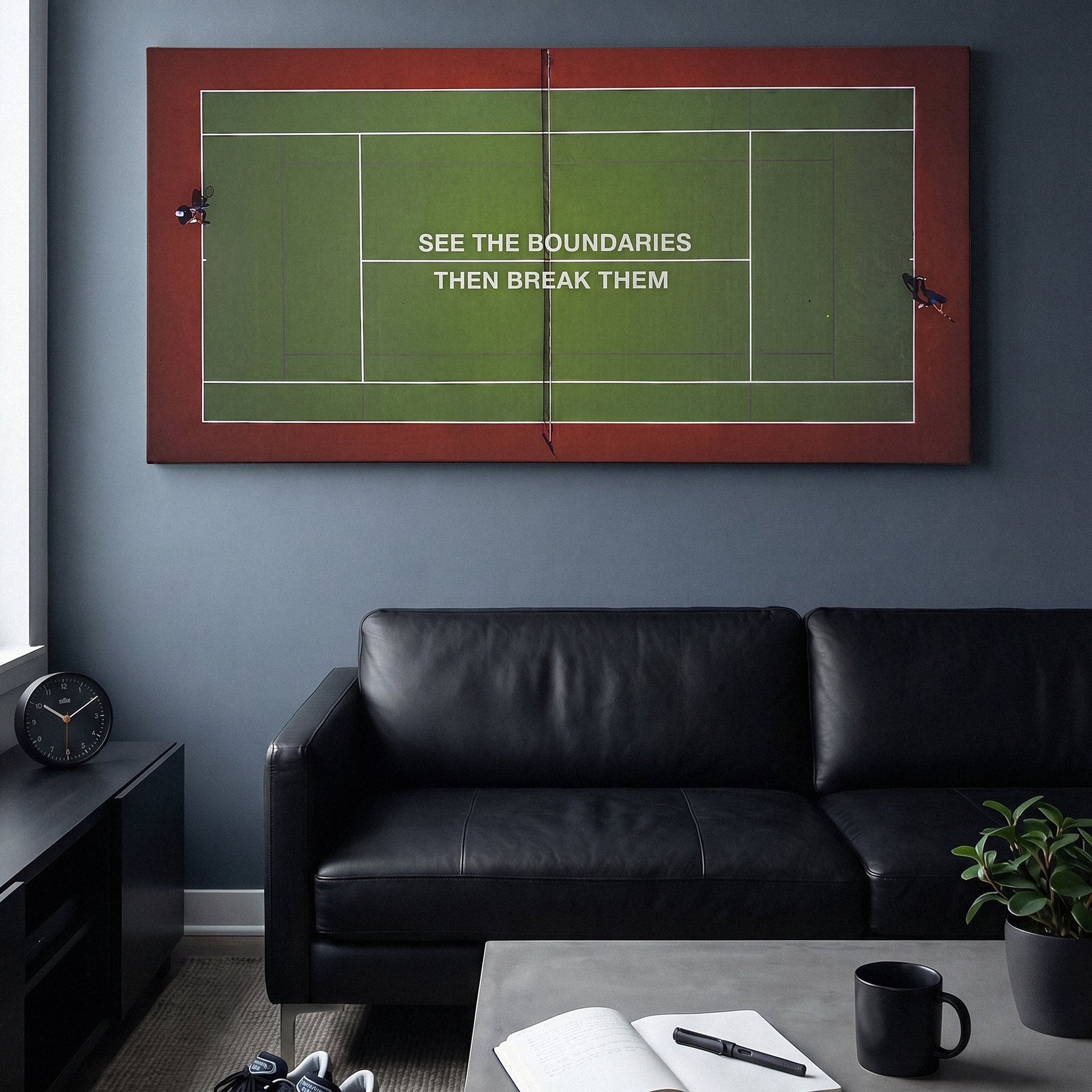 Break Boundaries Match tennis wall art canvas above a console table in a bright modern hallway