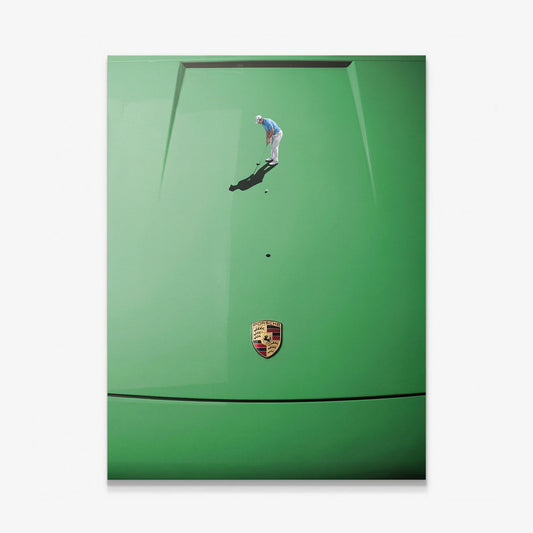 Car Putt canvas wall art of a golfer lining up a putt toward the hole on a green sports car hood seen from above