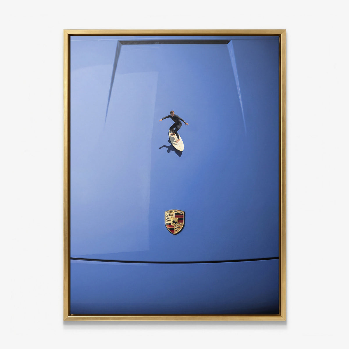 Car Surfing canvas in a gold floating frame