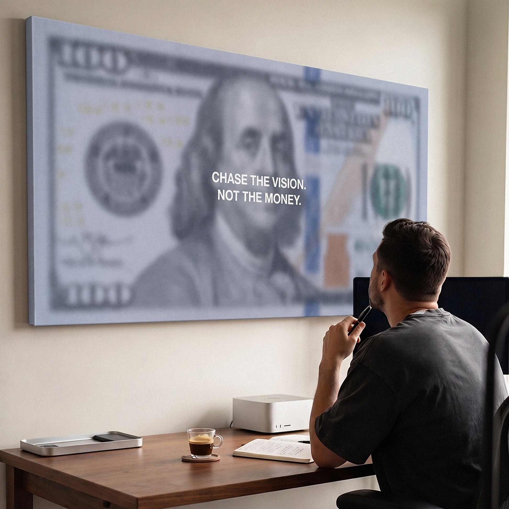Man viewing the Chase The Vision Dollar Edition money canvas in a bright modern office