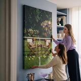 Two people viewing the Dachshund tennis canvas print together in a home setting