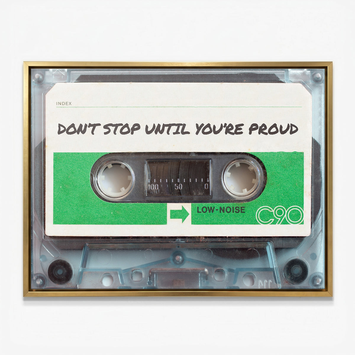 Don't Stop Until You Are Proud cassette canvas in a gold floating frame