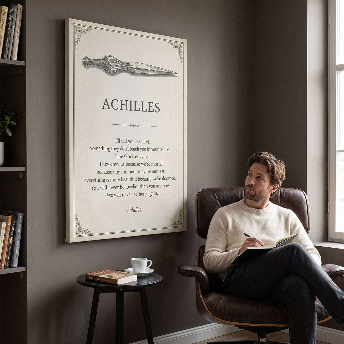 Man in a leather lounge chair looking up at the Doomed Achilles quote canvas in a study
