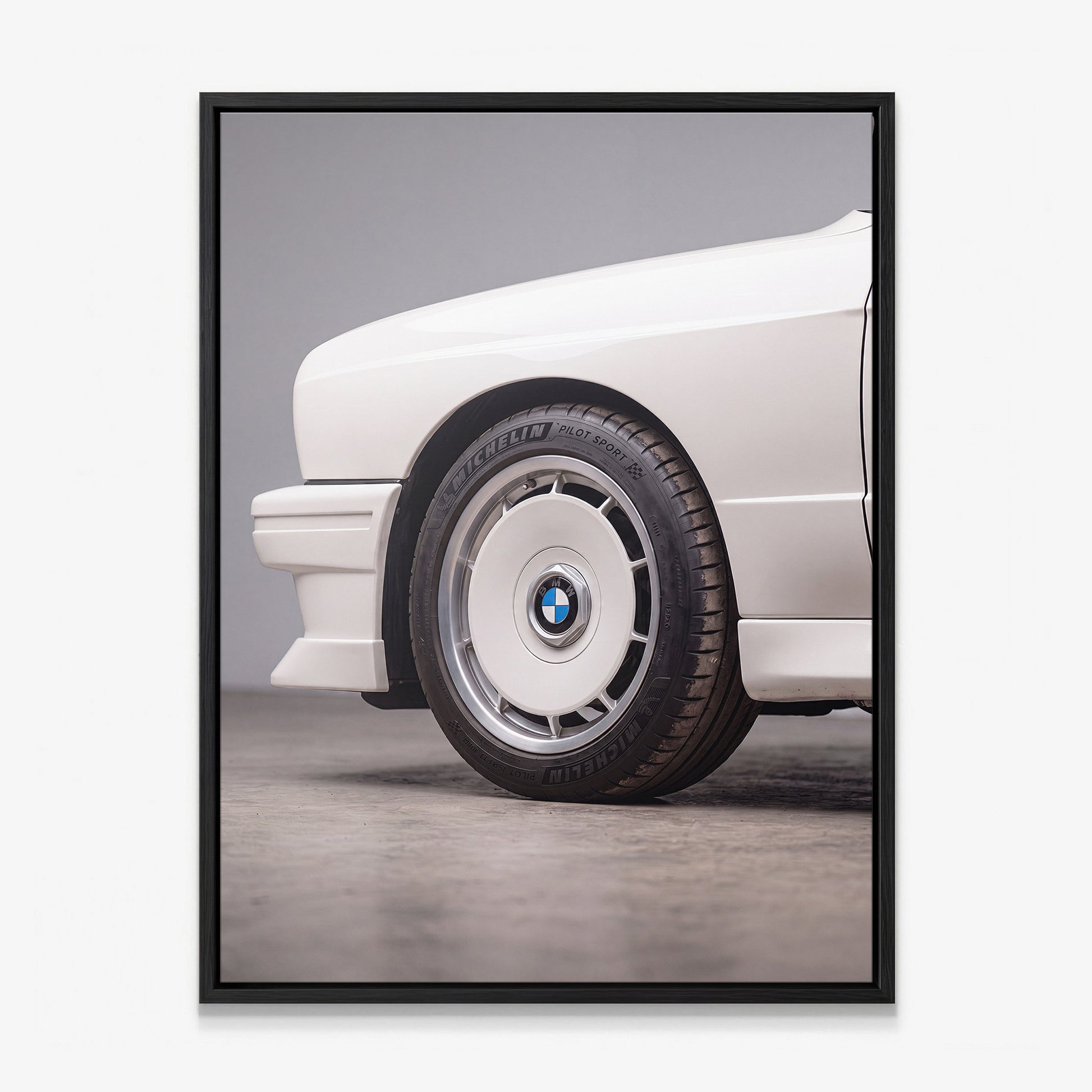 E30 Wheel classic E30 coupe alloy wheel close-up canvas wall art in a black floating frame