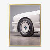 E30 Wheel classic E30 coupe alloy wheel close-up canvas wall art in a gold floating frame
