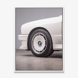 E30 Wheel classic E30 coupe alloy wheel close-up canvas wall art in a white floating frame