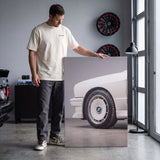 E30 Wheel classic E30 coupe alloy wheel close-up canvas wall art in a styled study