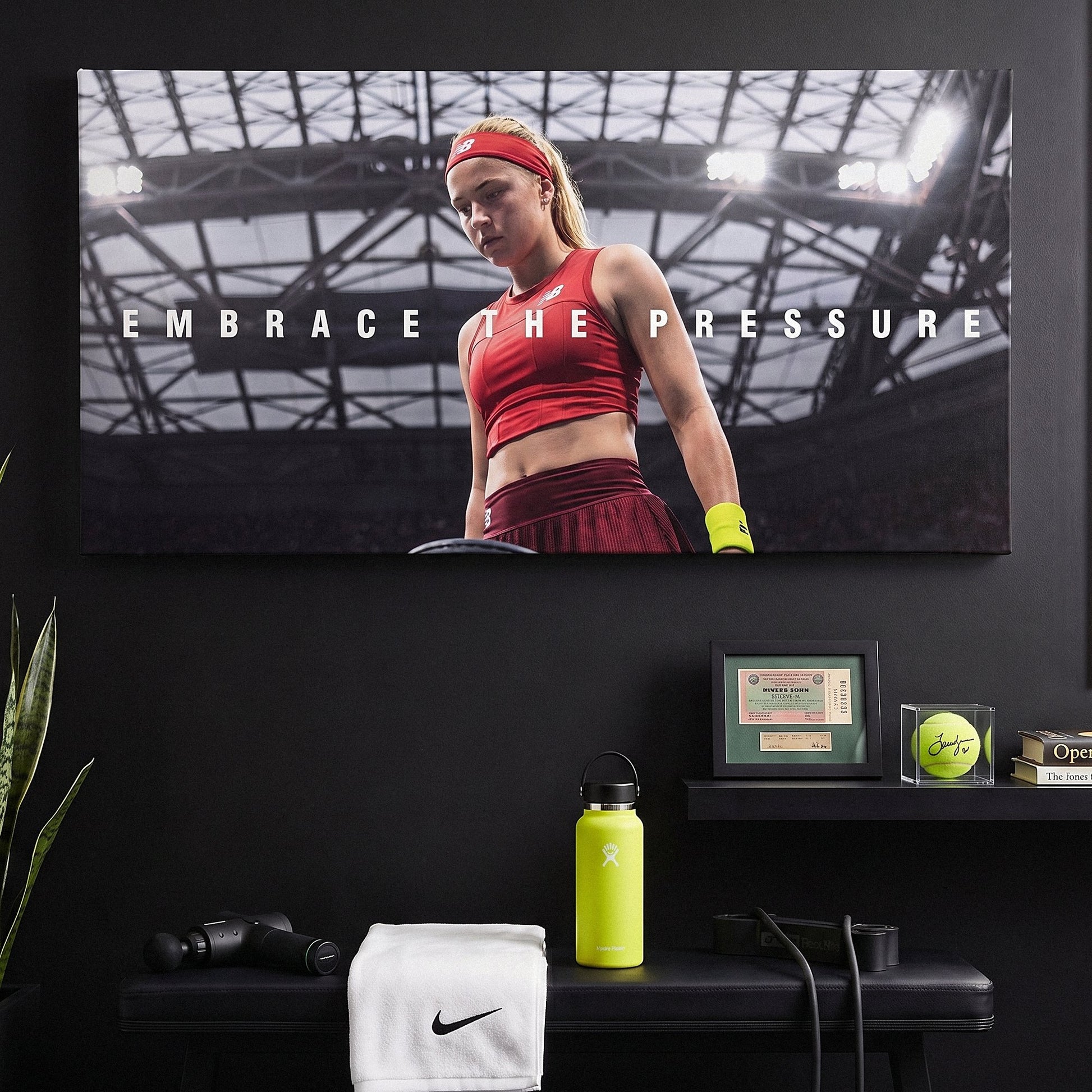 Embrace The Pressure tennis wall art canvas above a console table in a bright modern hallway
