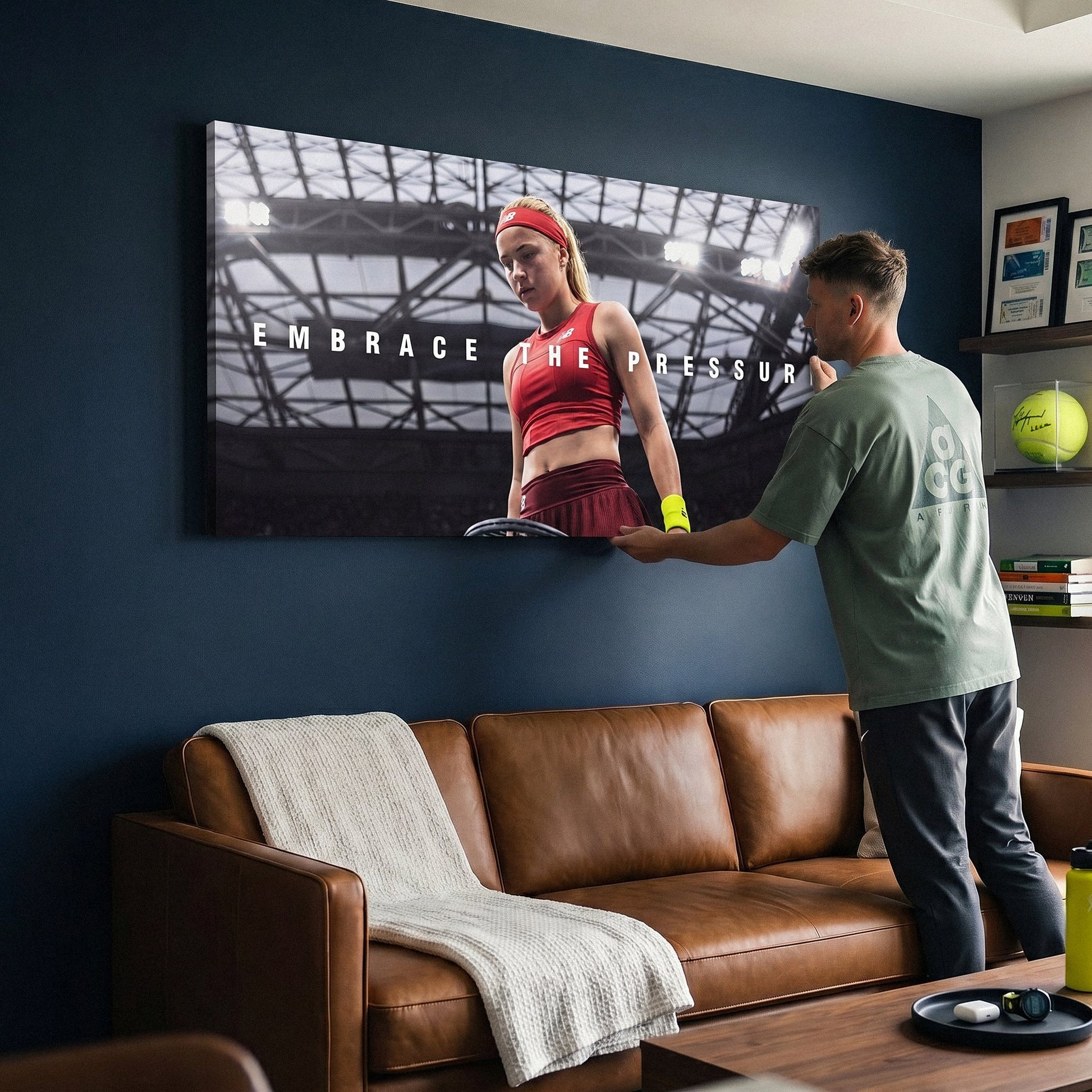 Person admiring the Embrace The Pressure tennis canvas print in a styled interior