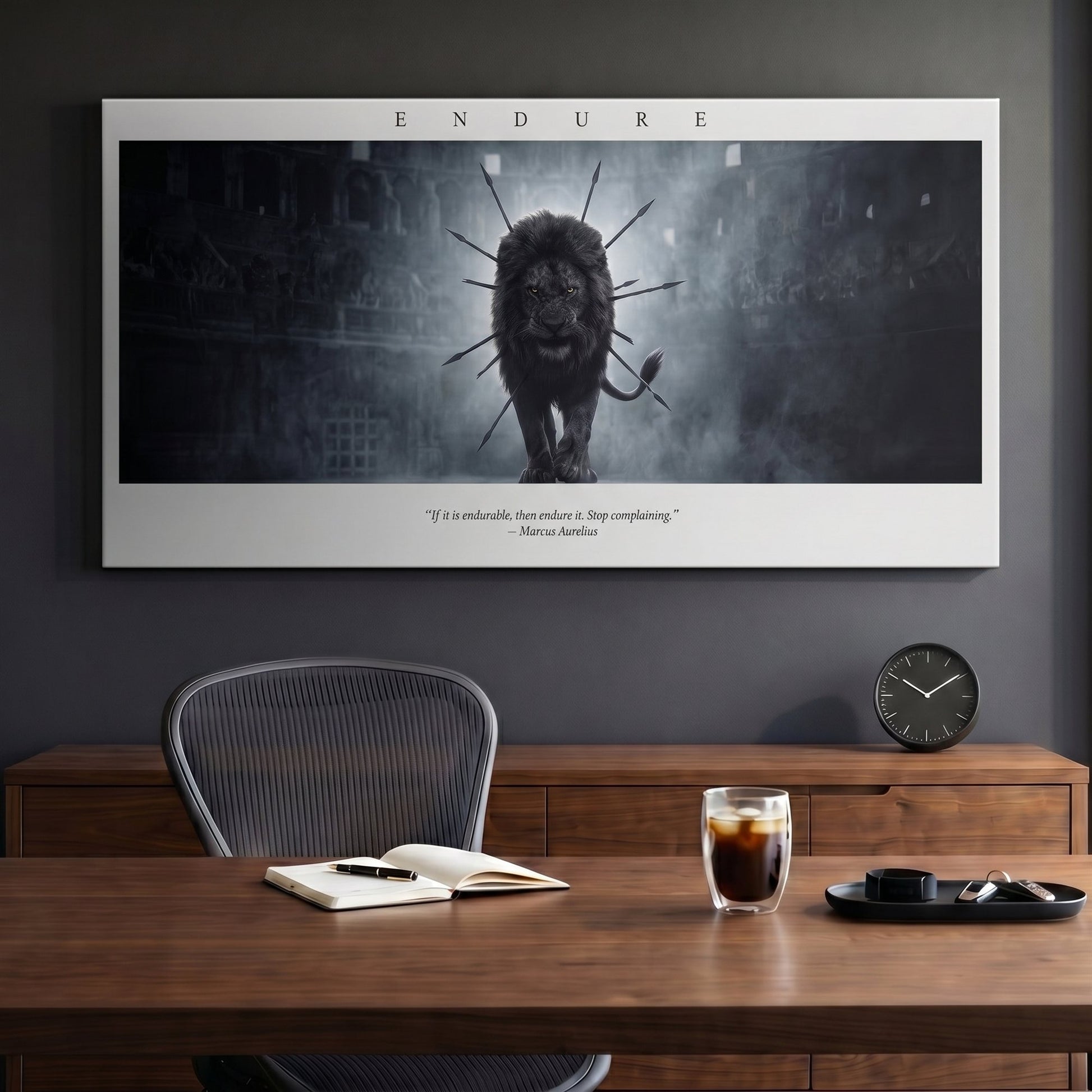 Endure The Arena Marcus Aurelius lion quote canvas above a desk in a dark office