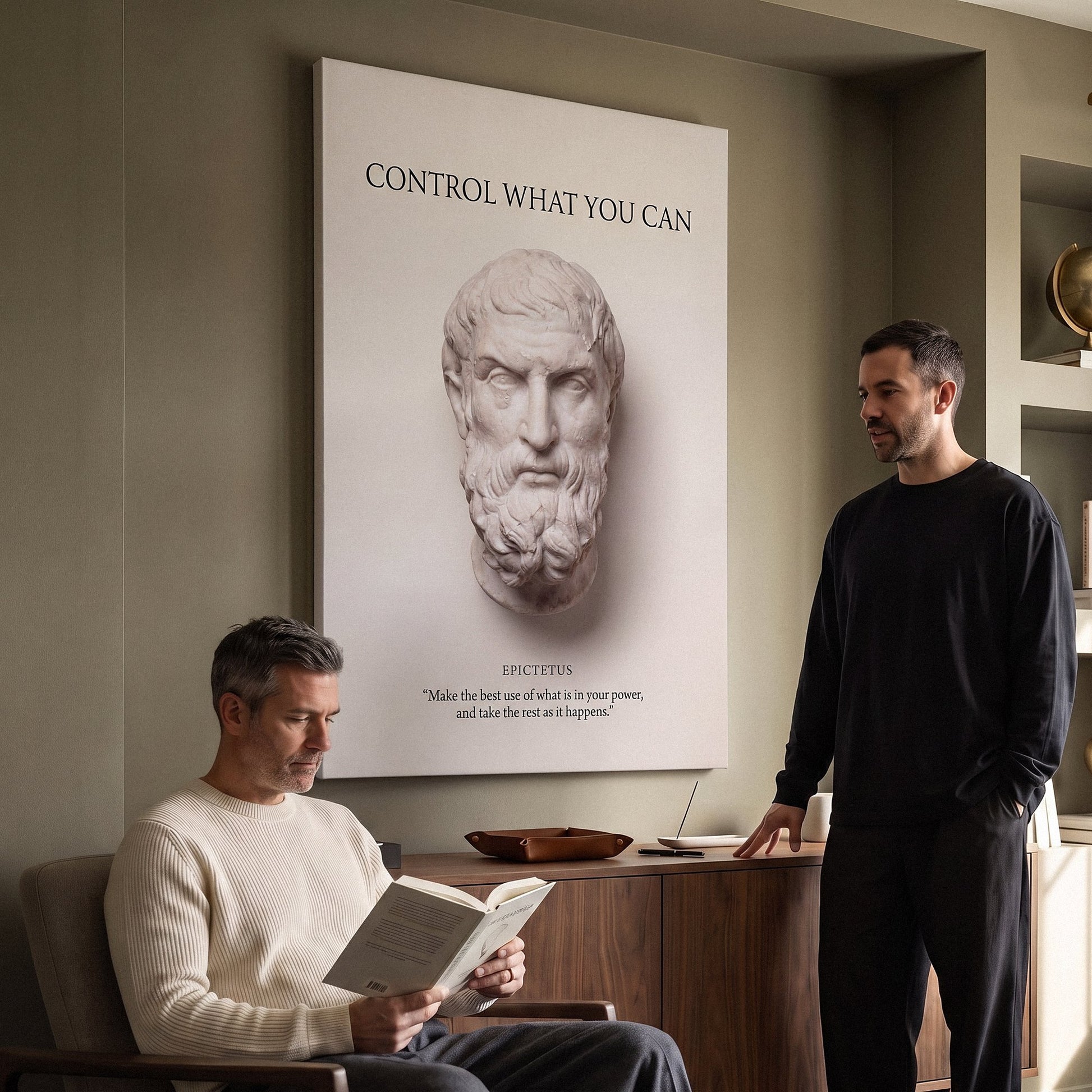 Two men with Epictetus Control What You Can Stoic canvas wall art in a lounge