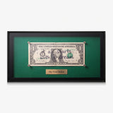 First Dollar canvas in a black floating frame
