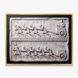 Boss Vs Leader Slab leadership wall art in a gold floating frame on a white wall