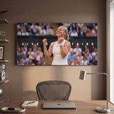Give Everything tennis wall art canvas above a console table in a bright modern hallway