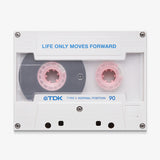 Life Only Moves Forward canvas wall art, a white cassette tape with pink spools and the line printed in blue on the label