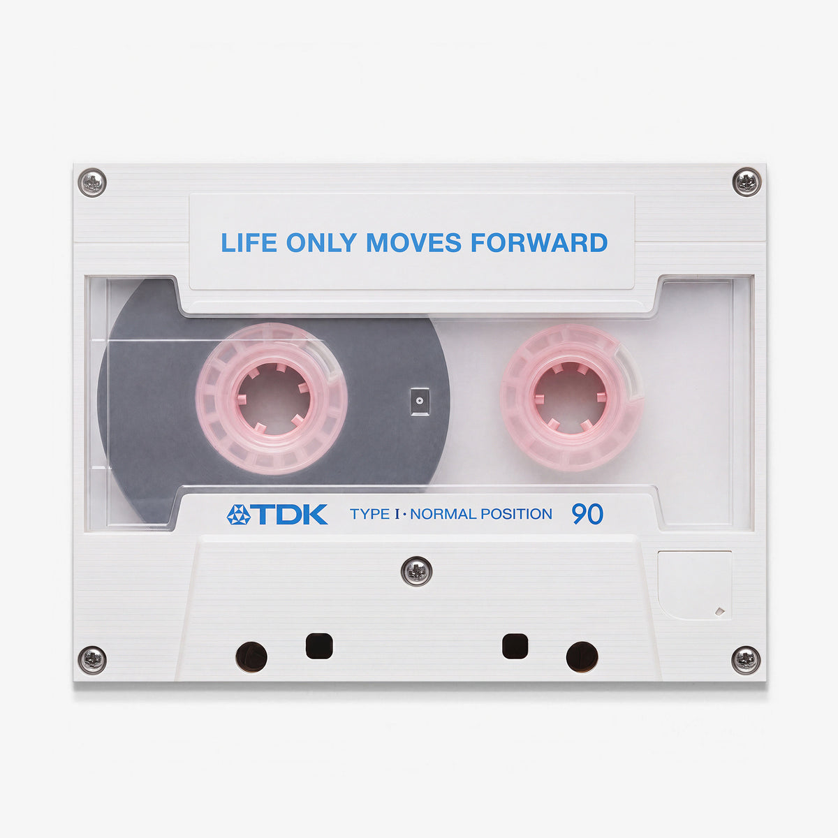 Life Only Moves Forward canvas wall art, a white cassette tape with pink spools and the line printed in blue on the label