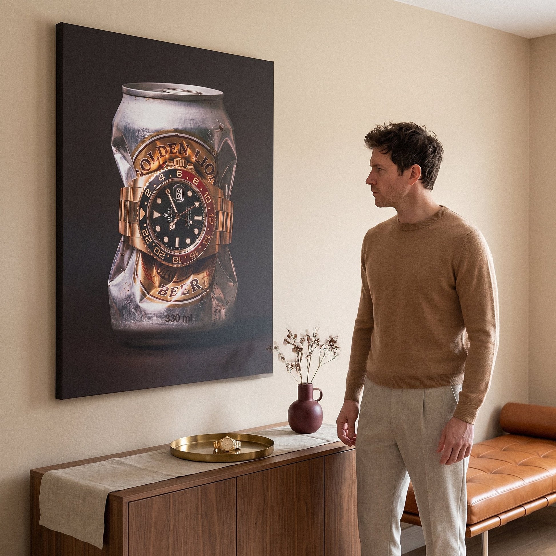 Lion's Share crushed silver beer can with a gold watch and black and red bezel canvas wall art in a home interior with a person viewing it