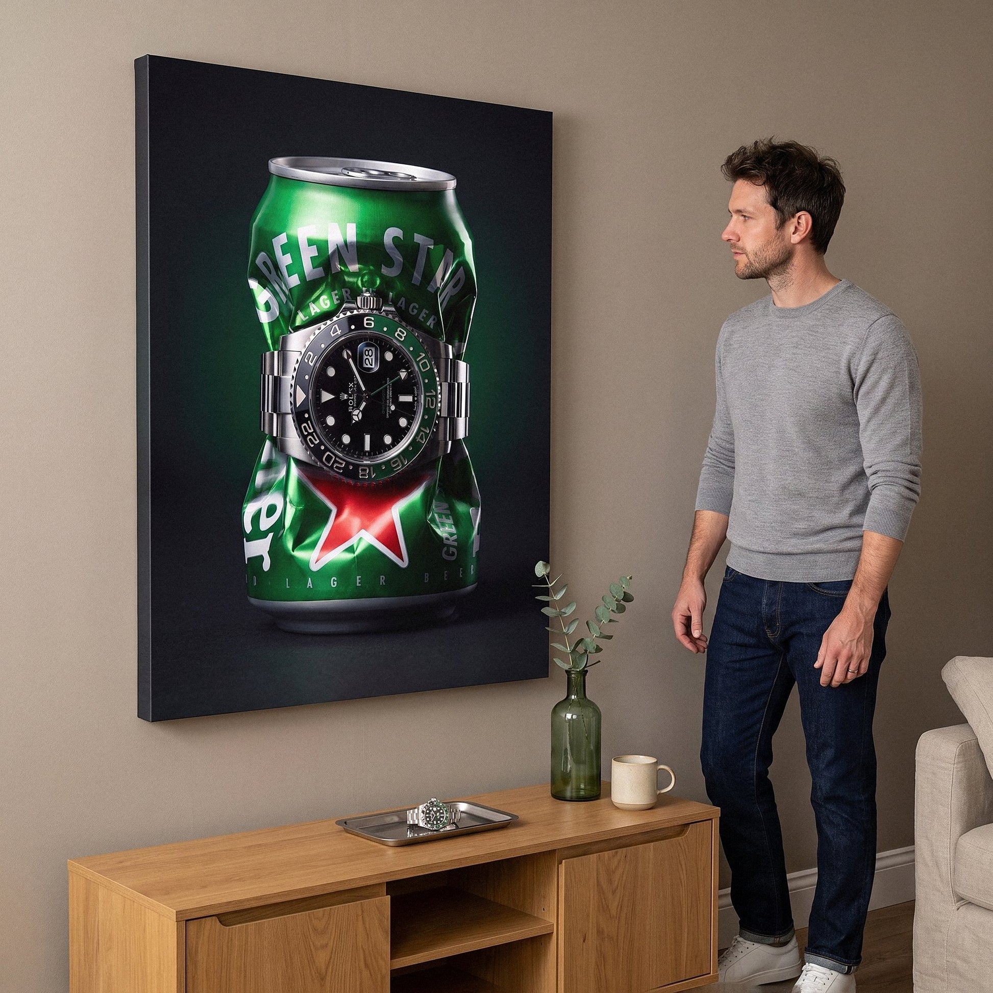 Local Time crushed green lager can with a green and black GMT bezel steel watch canvas wall art in a home interior with a person viewing it