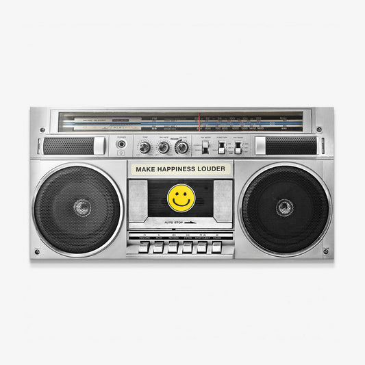 Make Happiness Louder Boombox canvas wall art, silver 1980s boombox with a yellow smiley cassette