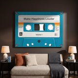 Make Happiness Louder turquoise cassette canvas above an oatmeal sofa between two table lamps on an espresso wall