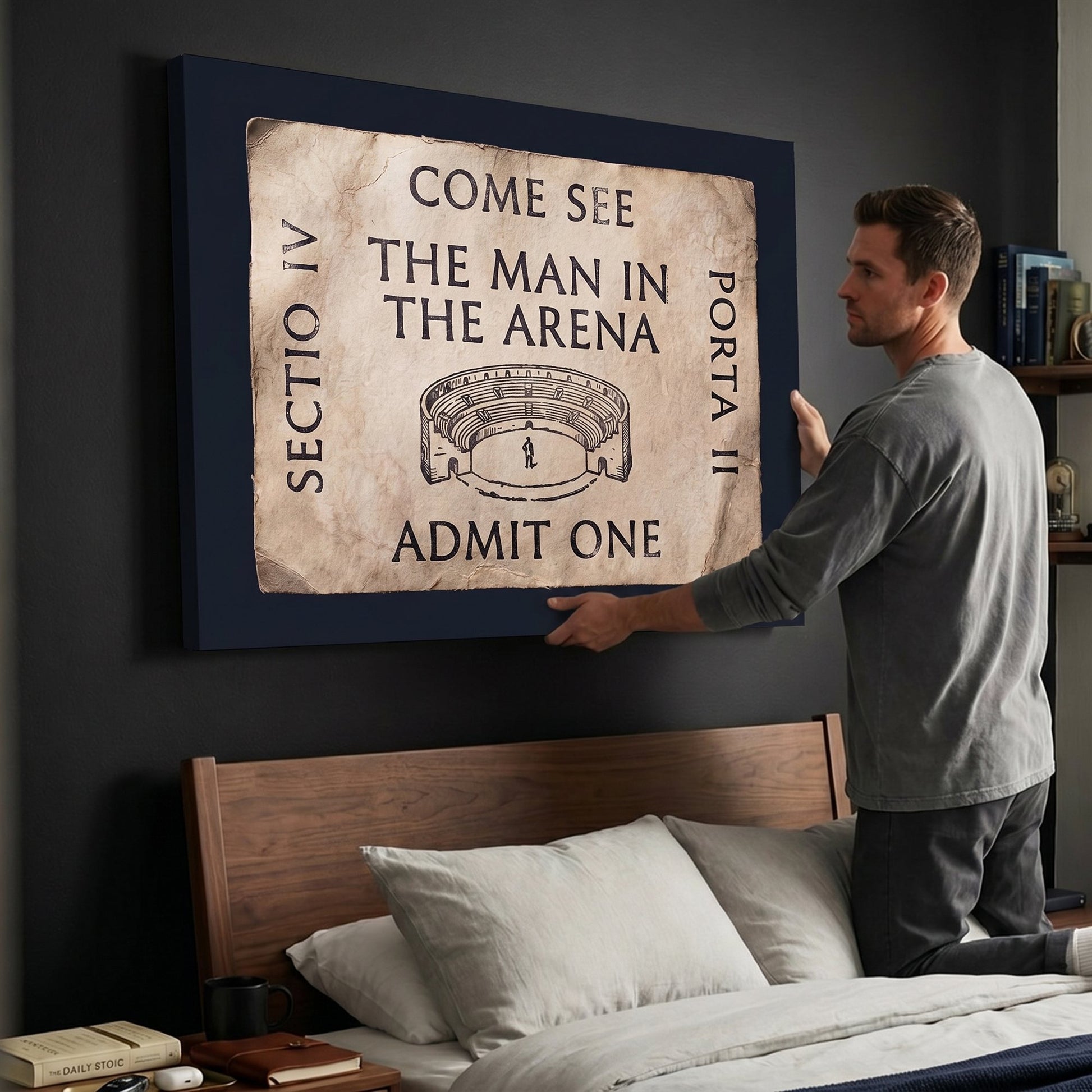 Man hanging the Come See The Man In The Arena ticket canvas in a modern bedroom