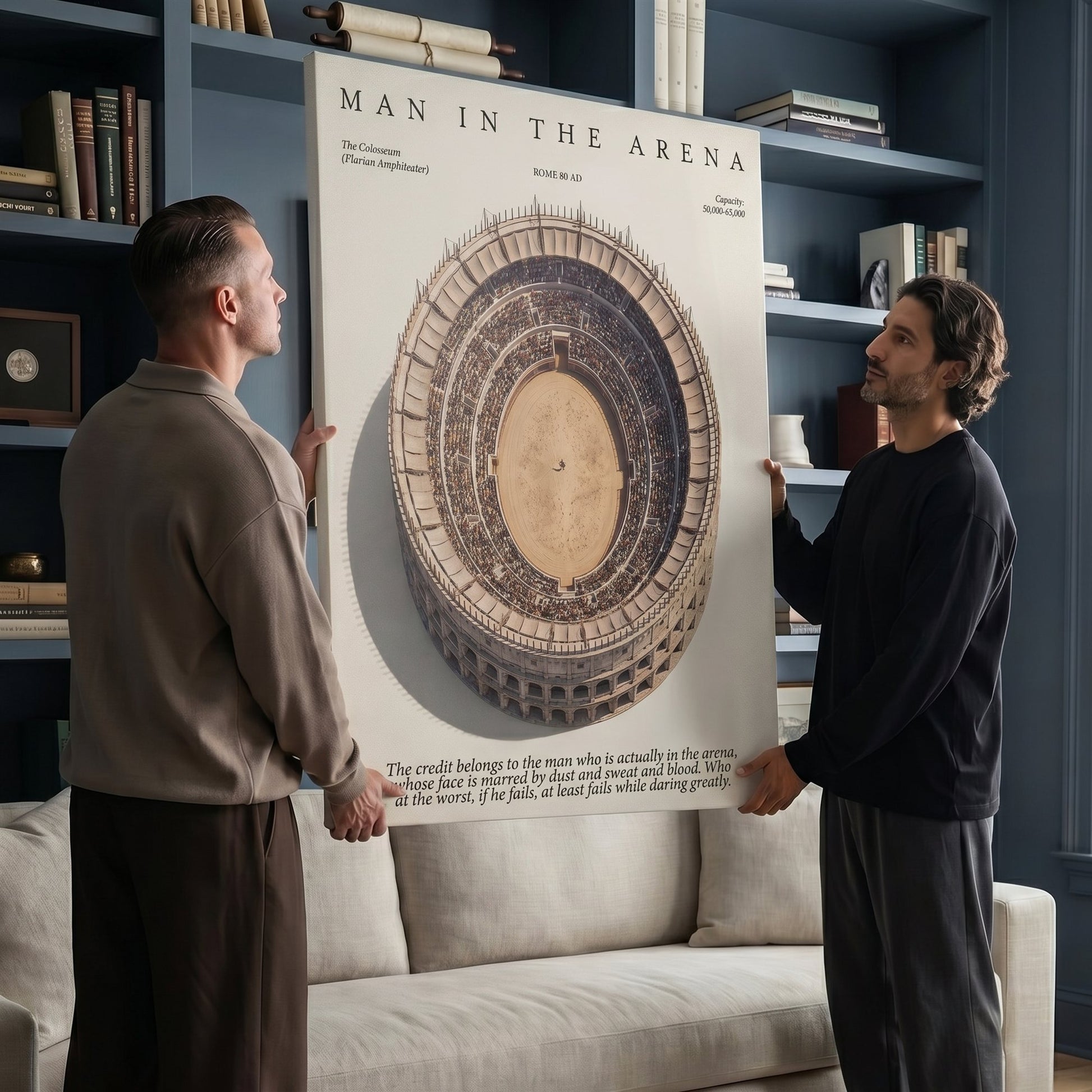 Two men hanging the Man In The Arena Colosseum canvas in a blue library