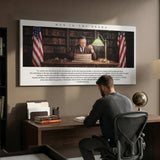 Man In The Arena Roosevelt quote wall art in a home office above a desk