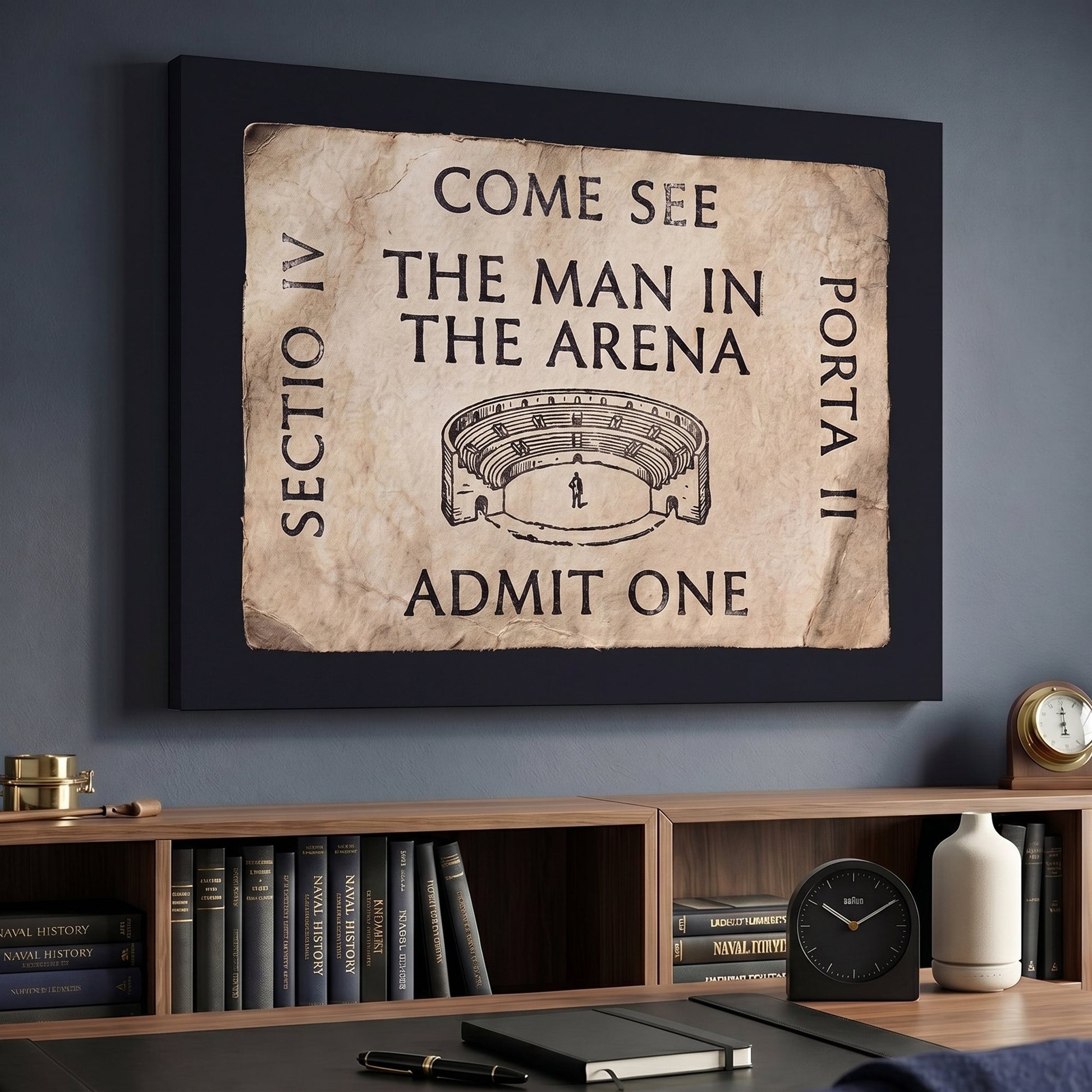 Come See The Man In The Arena ticket canvas above a credenza in a naval-history study