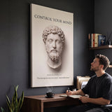 Man at a desk below Marcus Aurelius Control Your Mind Stoic canvas wall art