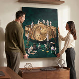 A couple hanging the Mining For Gold gold watch canvas on a cream wall