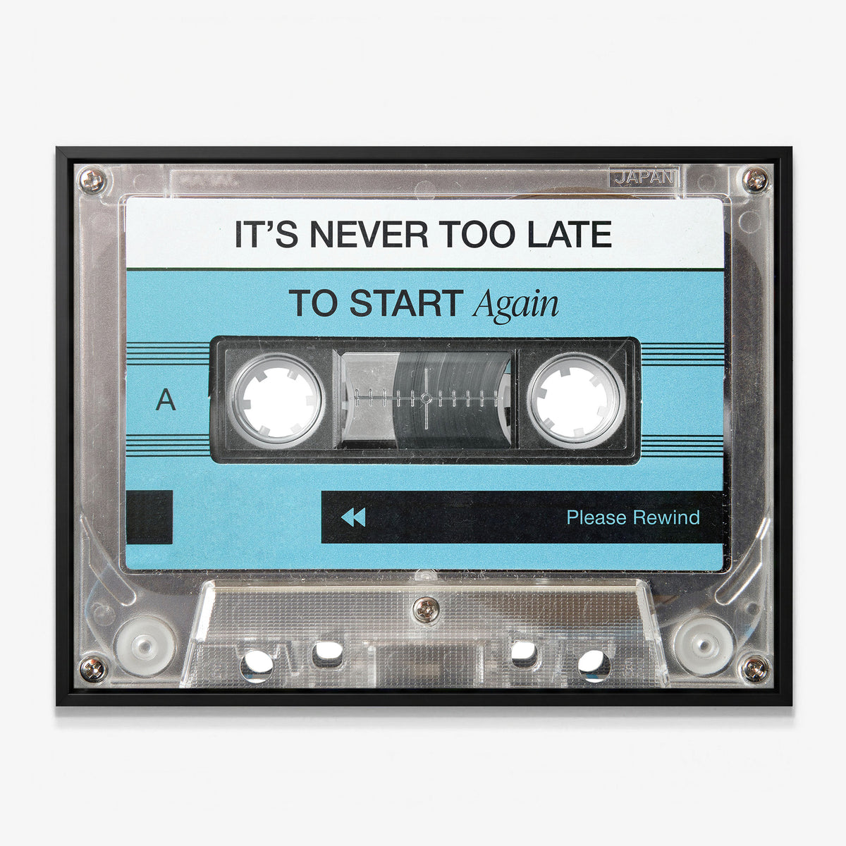 Never Too Late blue cassette canvas in a black floating frame