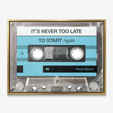 Never Too Late blue cassette canvas in a gold floating frame