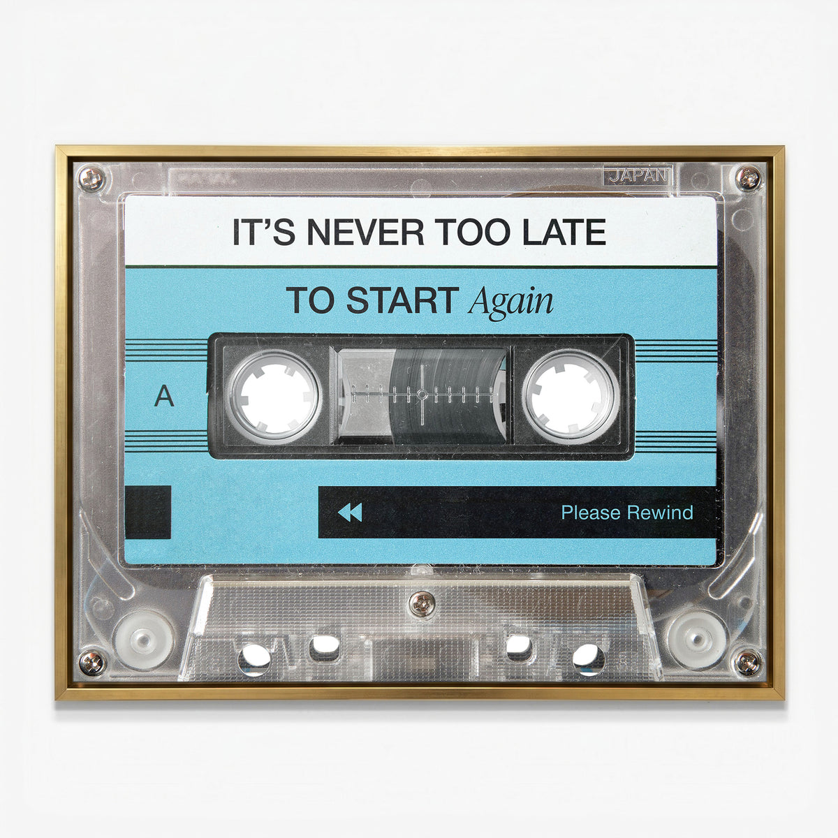 Never Too Late blue cassette canvas in a gold floating frame