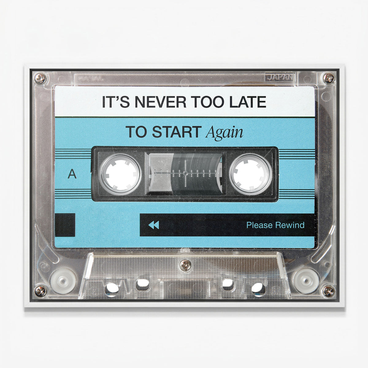 Never Too Late blue cassette canvas in a white floating frame