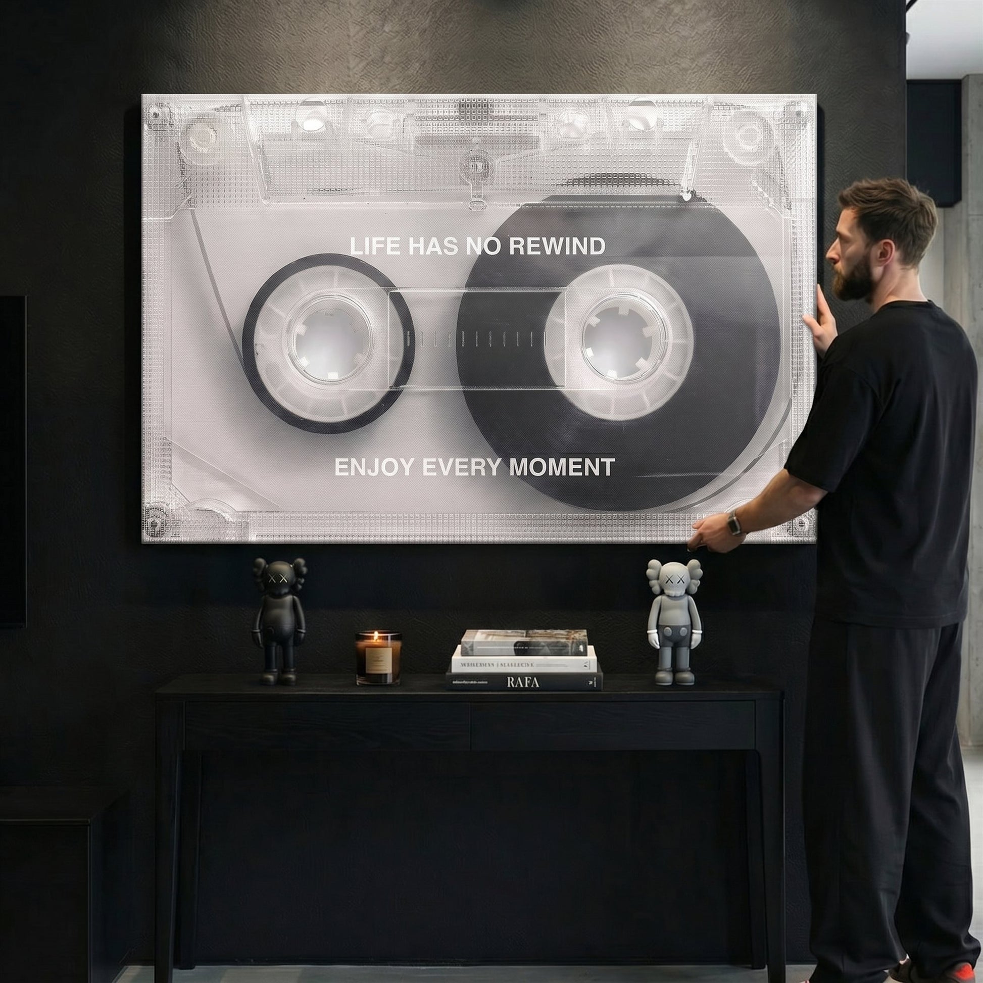 Life Has No Rewind cassette canvas above a black console with designer figures in a modern space