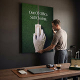 Out Of Office golf canvas held by a person
