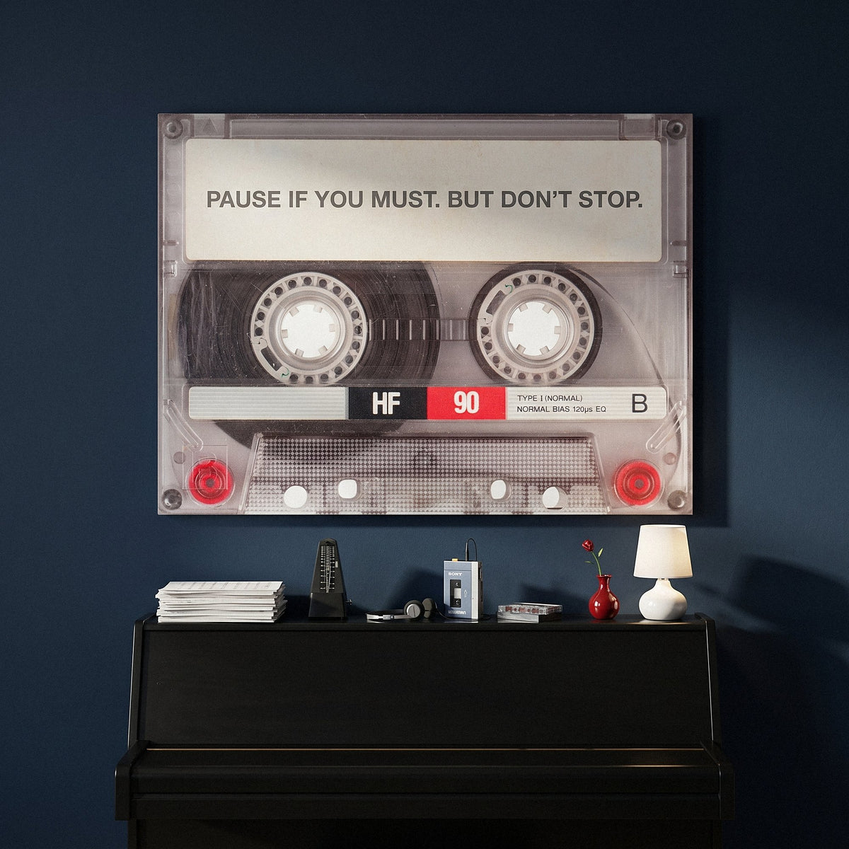 Pause If You Must clear cassette canvas hanging on the wall of a modern home office