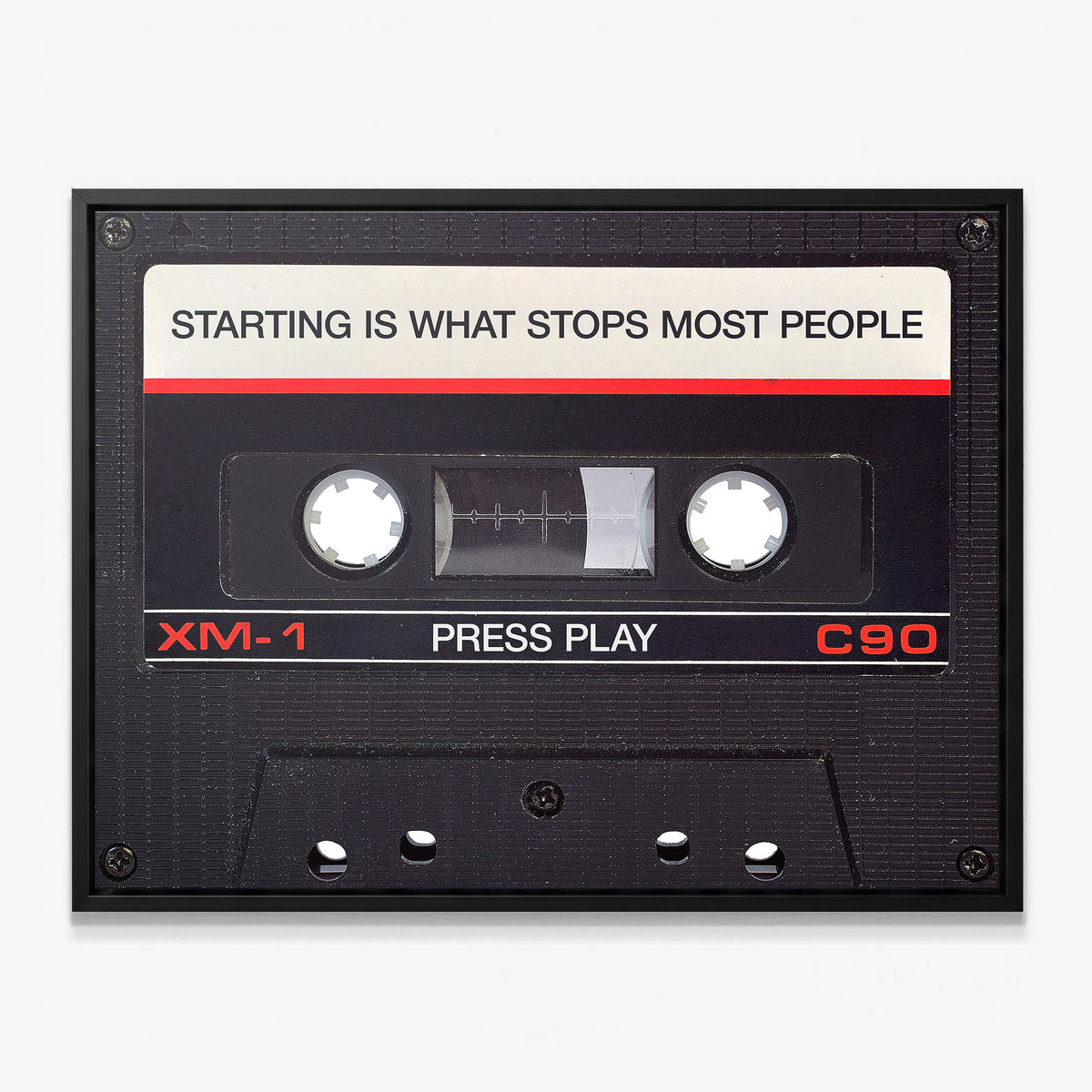 Press Play black cassette canvas in a black floating frame