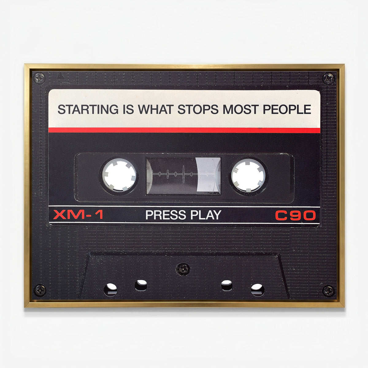 Press Play black cassette canvas in a gold floating frame
