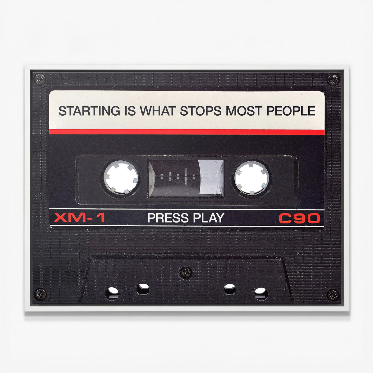 Press Play black cassette canvas in a white floating frame